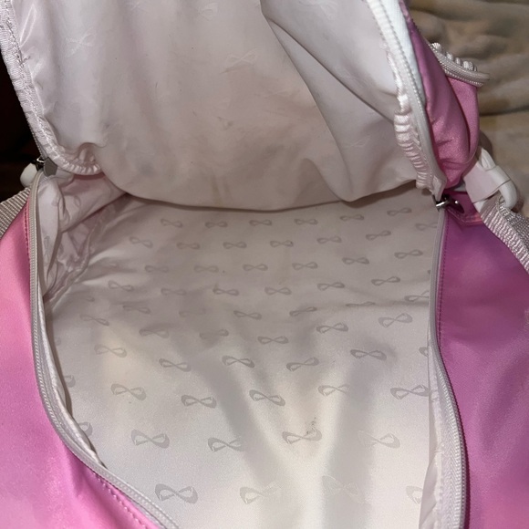 LIGHT PINK NFINITY BACKPACK AS IS - Picture 9 of 11
